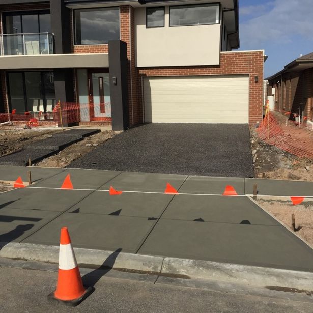 Newly concreted driveway protected to prevent accidental damage