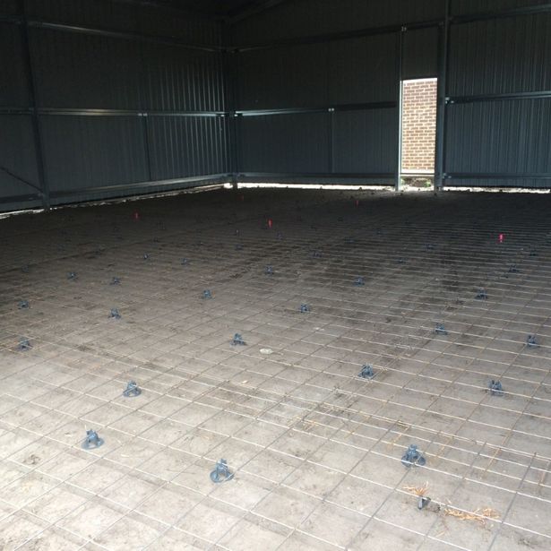 Large room floor applied with reinforcing mesh ready for concreting